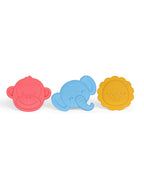 Three colorful animal-shaped silicone Whine Stoppers, including a red monkey, a blue elephant, and a yellow lion, arranged in a row on a plain white background.
