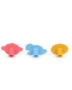 Three silicone baby Whine Stoppers in red, blue, and yellow, arranged horizontally on a plain white background.