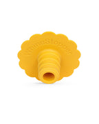 A bright yellow silicone children's teether with the brand name 'Whine Stopper' embossed on the top, shown on a clean white background.